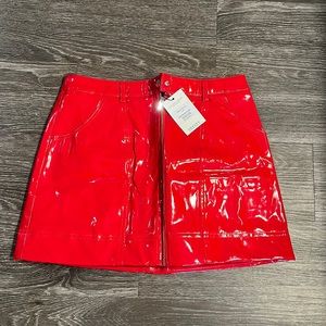 Mistress rocks leather skirt